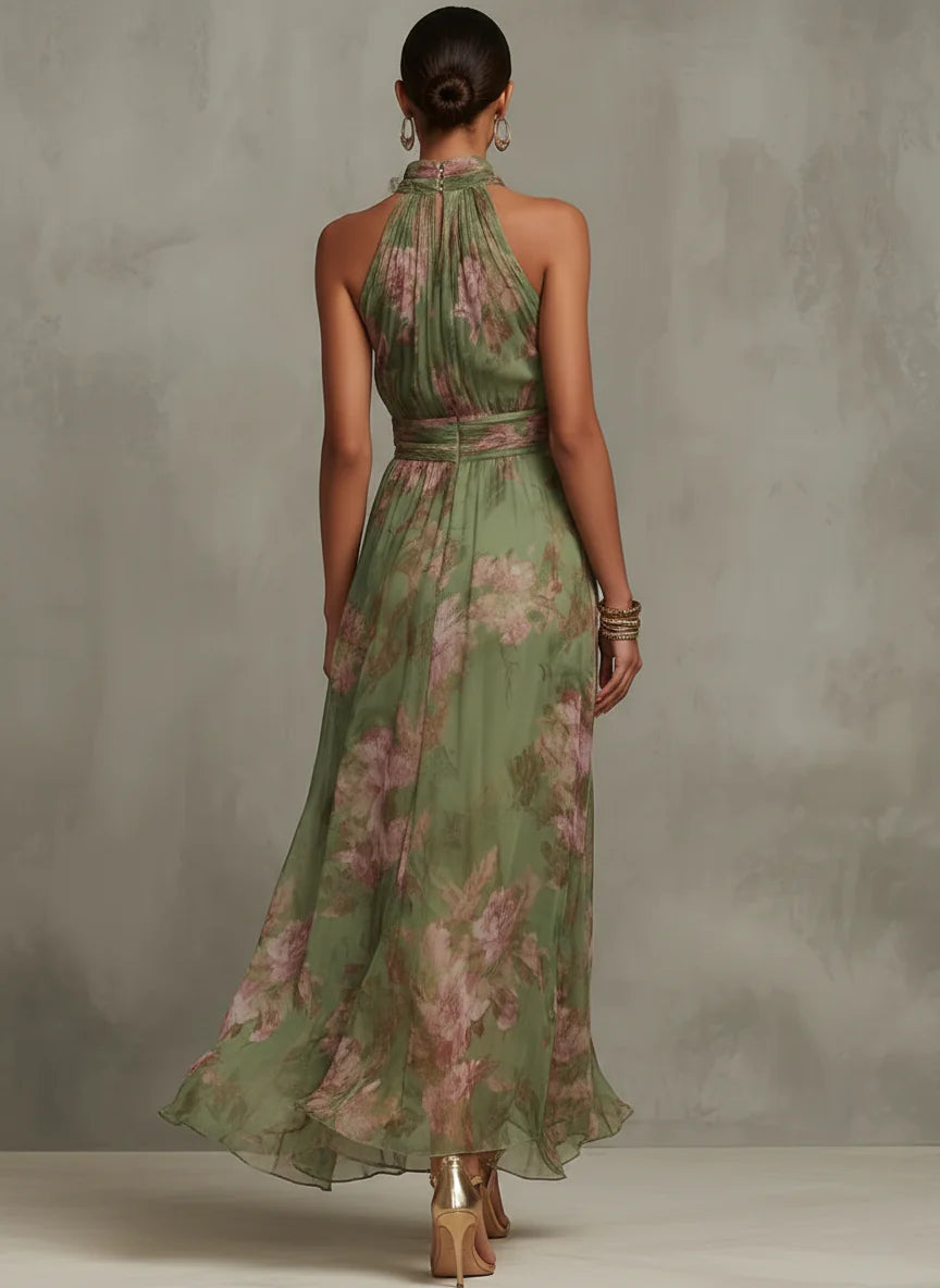 Vestido largo de gasa verde con estampado floral y escote halter