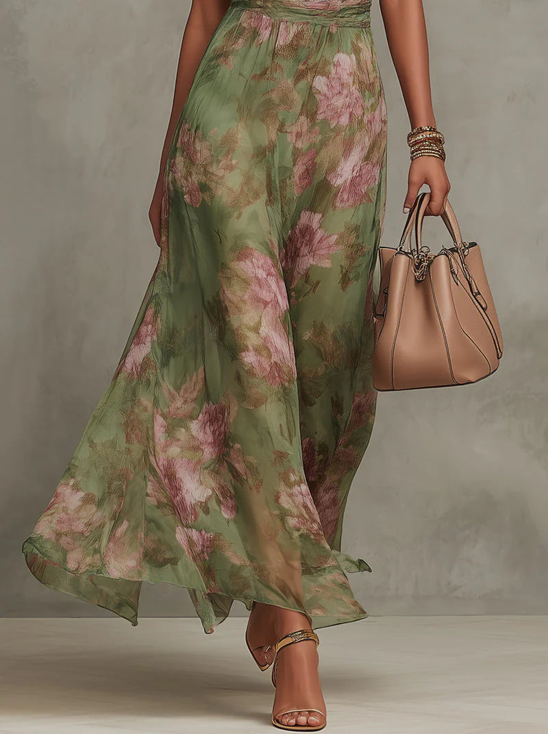 Vestido largo de gasa verde con estampado floral y escote halter