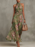 Vestido largo de gasa verde con estampado floral y escote halter